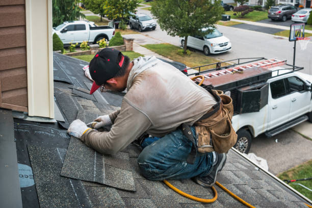 Professional Emergency Roof Repair technician working in Arkdale, WI